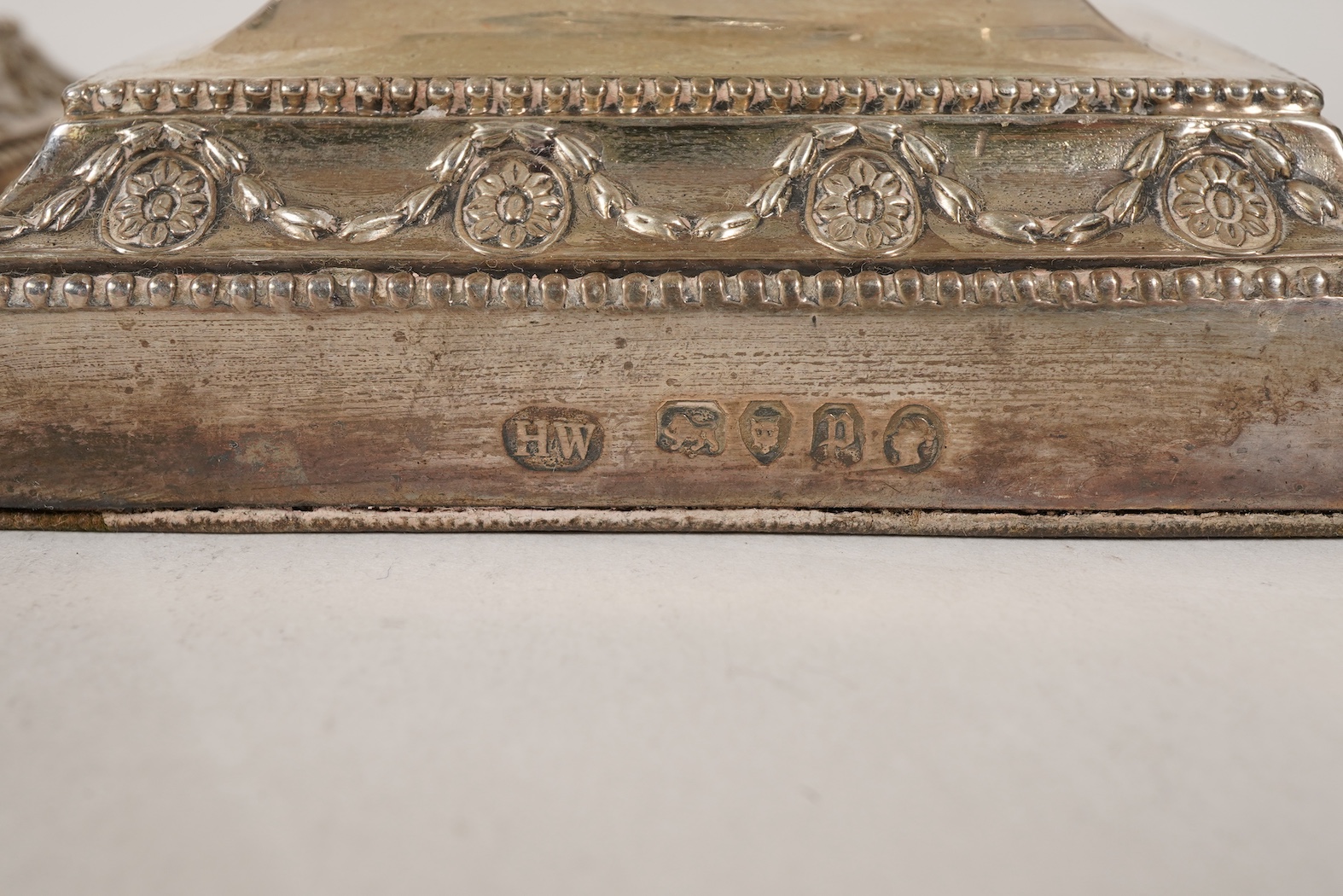 A pair of Victorian silver candlesticks, with fixed sconces, by Henry Wilkinson & Co